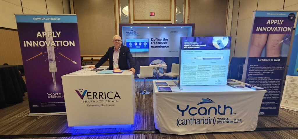 Verrica Pharmaceuticals booth at a conference.