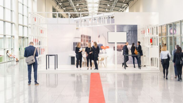 People walking at a trade fair.